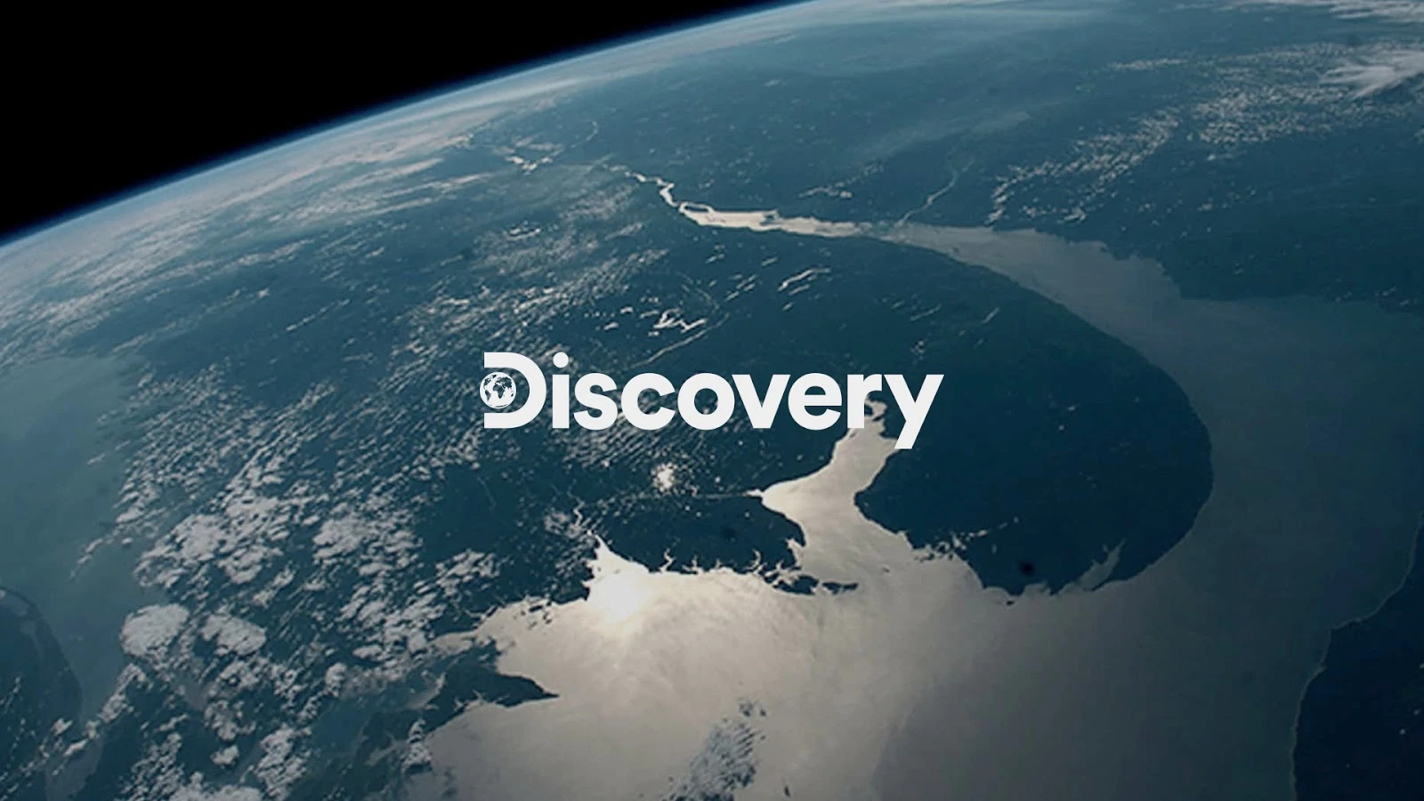 Marca Discovery sobre imagem do planeta Terra